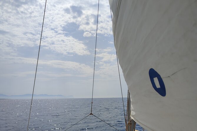4 Hours Catamaran Tour to the Scala dei Turchi - Capo Rossello lighthouse and the Madonnina in the rock