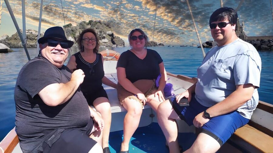 Aci Trezza boat tour sunset and dinner sicilian family home - Faraglioni: myth, geology, and the best kind of photo moment