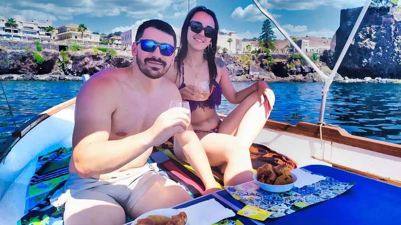 Aci Trezza: Cyclops Coast Boat Tour with Food and Swimming - Hot Sicilian lunch, organic wine from Agrigento, and classic tastings