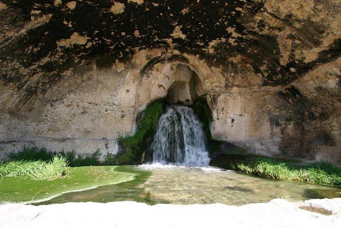 Ancient Syracuse: private guided tour of the Neapolis archaeological park - The Ear of Dionysius: legend in a short stop