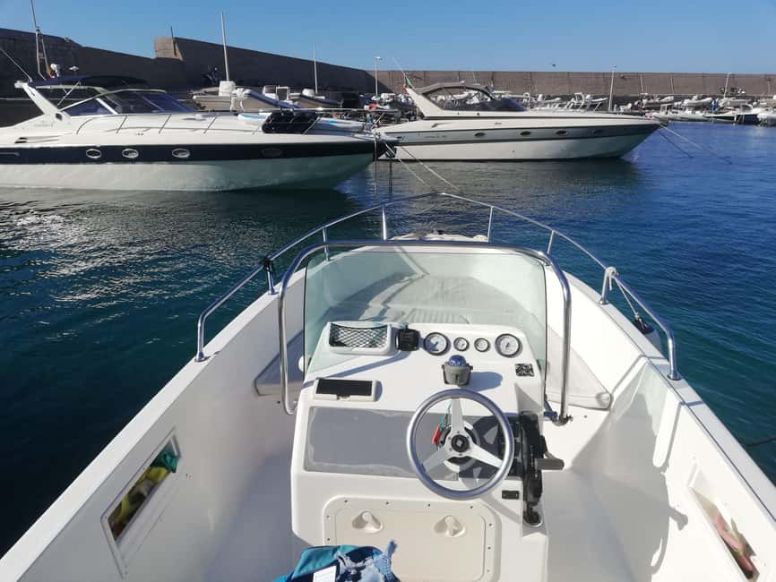 Aperitif on a boat at sunset at the Queen Cave - Marina Arenella meetup: start where the sunset energy is