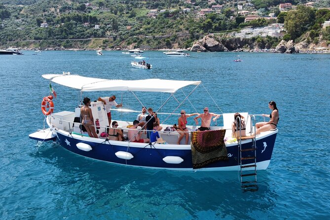Boat excursion along the coast of Cefalù - Crew personalities: Mario and Est, or Nicola, and why it matters