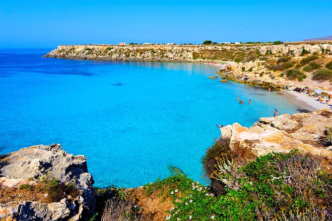 Boat tour Excursion from Trapani to Favignana and Levanzo 8 hours - Cala Minnola in Levanzo: snorkeling time and a pine-shadowed cove