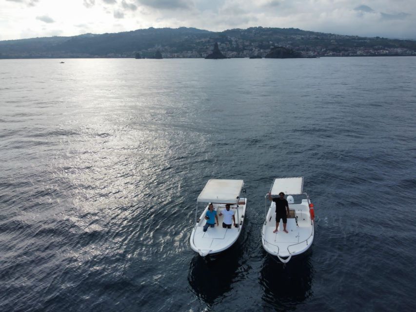 boat tour exploring and searching for dolphins in Acitrezza - The first sea look: Lachea Island and the Cyclops nature reserve