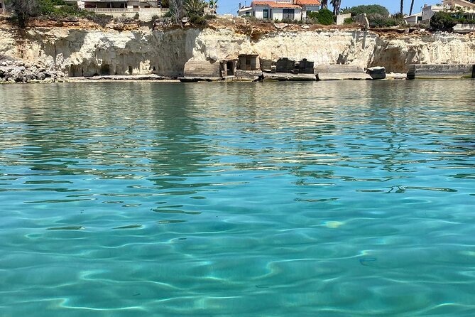 Boat tour from Avola to Portopalo with a stop in Marzamemi - Marzamemi Break: Lunch Time and a Smart Dry-Clothes Move