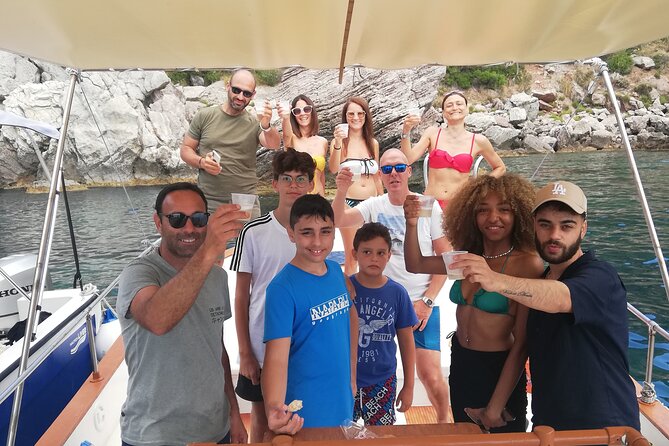 Boat tour Giardini Naxos Taormina Isola Bella Blue Grotto - Taormina from the sea: theater cliffs, coves, and photo angles that land differently