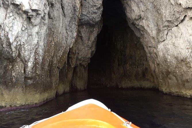 Boat tour of Ortigia Island and sea caves - Getting history and local tips from an English-speaking guide