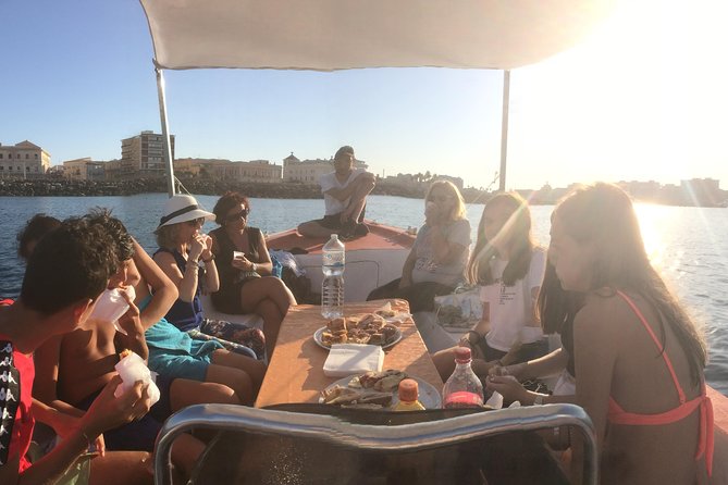 Boat tour of Ortigia Island and sea caves - Where you start in Siracusa, and how to make the timing work