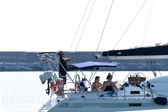 Catania boat tour along the coast with aperitif and snorkeling - Aperitivo on Board, Sicilian Snacks, and the Prosecco Setup