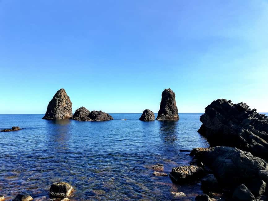 Catania: Cyclops Coast Cruise with Appetizer & Snorkeling - Cyclopean Isles and the second swim slot: your snorkeling payoff