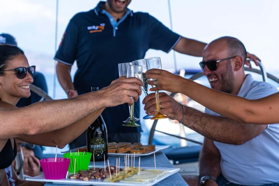 Catania: Cyclops Coast Cruise with Appetizer & Snorkeling - Food, wine, and what makes the aperitivo feel like a real Sicilian moment