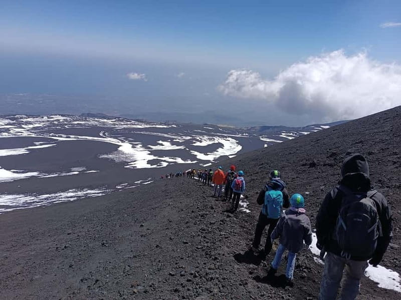 Catania, Etna trekking with guide and cable car at 3000 meters + transfer available - Valle del Bove, where the walk turns from crater drama to caldera scale