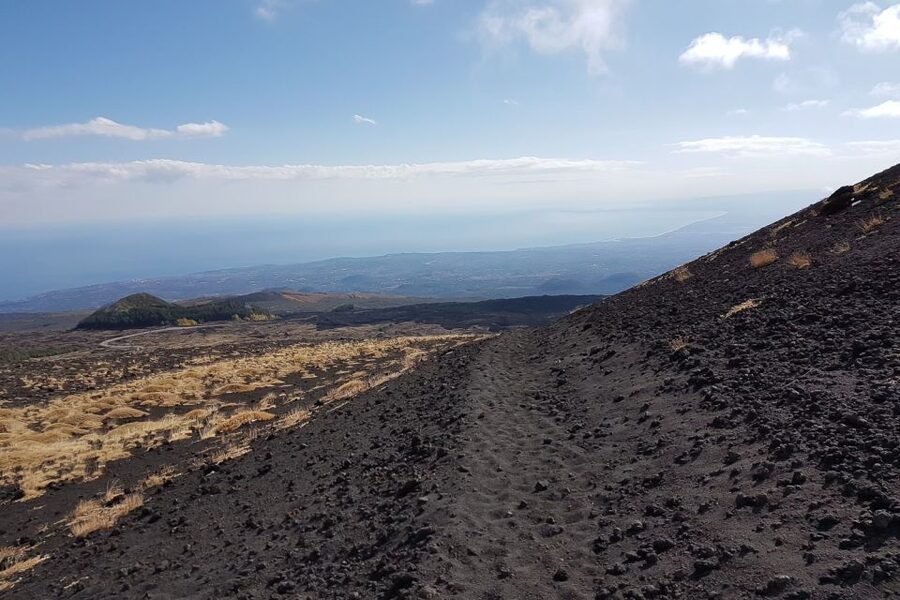Catania: Mount Etna Trekking Trip off the Tourist Path - Silvestri Craters break: active Etna in the background