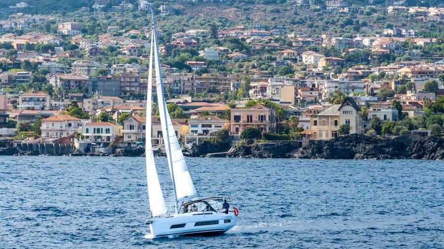 Catania: Sail Tour of Cyclops Coast with Sicilian Aperitif - Aci Trezza’s Swim Stop: Snorkeling, SUP, and Staying Safe