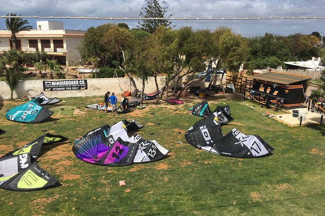 Complete rental of kitesurf equipment - The Team Experience at KTS: Alain, Max, Giacomo, and Giovanni