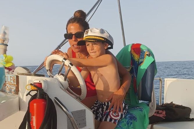 Discovering Cefalù's Coastline Activity on a Mini Catamaran - What a 3-hour mini catamaran feels like with up to 12