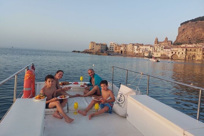 Discovering Cefalù's Coastline Activity on a Mini Catamaran - Coastline route: multiple swimming stops and possible cave time