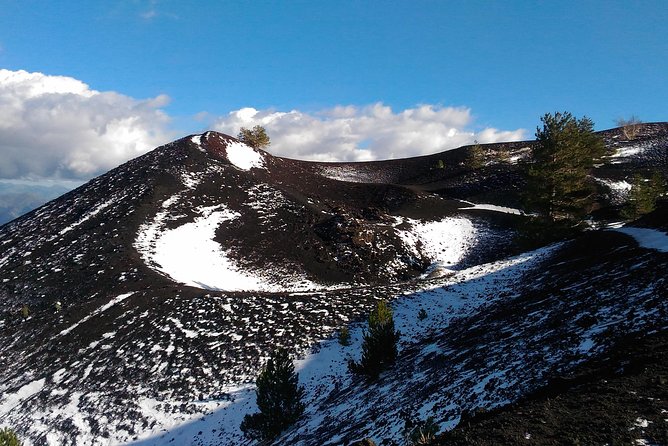 Etna and Taormina con pranzo - Grotta Cassone Cave Visit: Helmets, Torches, and Snow Risks