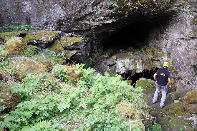Etna Tour in 4x4 - Grotta dei Tre Livelli lava tube: helmets, lights, and cautious footing