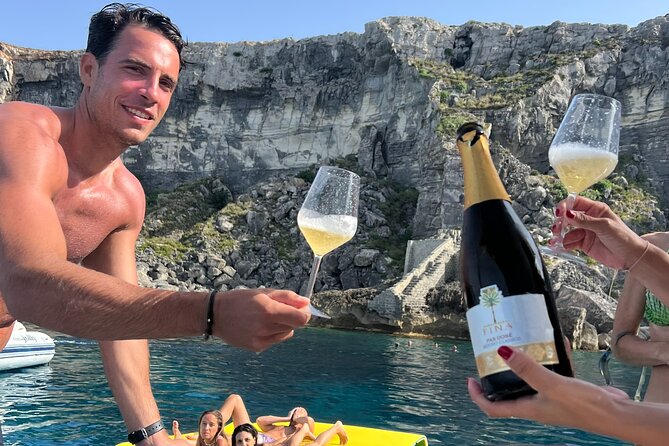 Exclusive Favignana Levanzo tour with tasting - Cala Fredda: pebble beach charm and strong color in the water