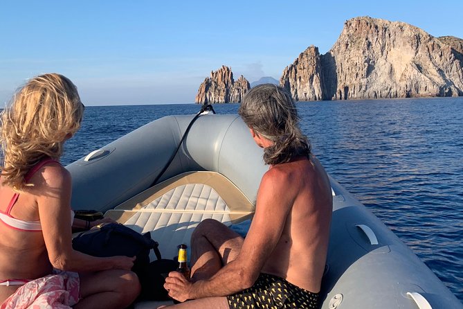 Exclusive tour of Stromboli island, Boat tour with Pasqualo - Strombolicchio sea stack, last swim, and the deep-blue moment