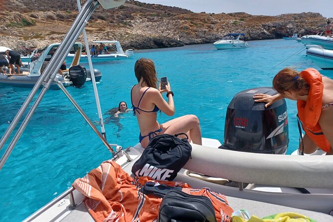 Favignana and Levanzo: Island tour by rib boat from Trapani - Favignana stop 1: Cala Rossa, turquoise water and quick shore time