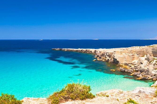 Favignana inflatable boat tour, wine tasting, snorkeling and relaxation - Isola di Favignana: coves, an aperitif, and one hour in town