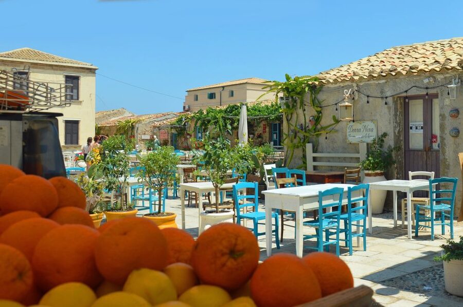 From Catania: Syracuse, Ortigia & Marzamemi Full-day Tour - Neapolis Archaeological Park: how one site covers protohistoric to Byzantine eras