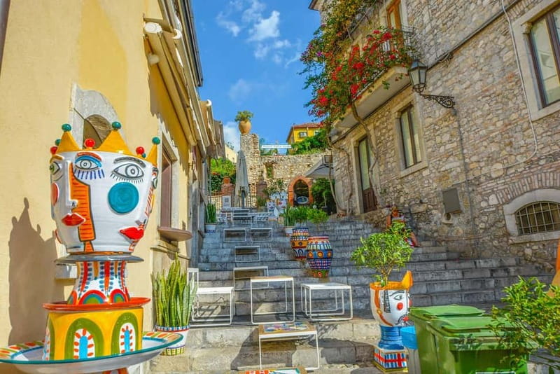 From Catania: Taormina, Isola bella & Castelmola tour - Audio guide reality check: good concept, mixed delivery