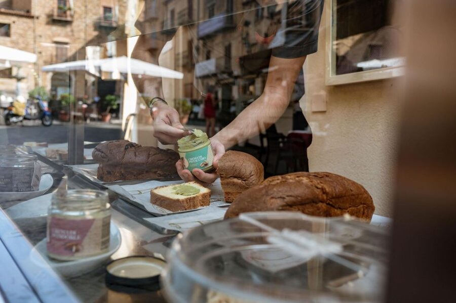 From Cefalù: Authentic Sicilian Villages and Happy Hour - Castelbuono first: medieval streets, Ventimiglia Castle, and the panettone moment