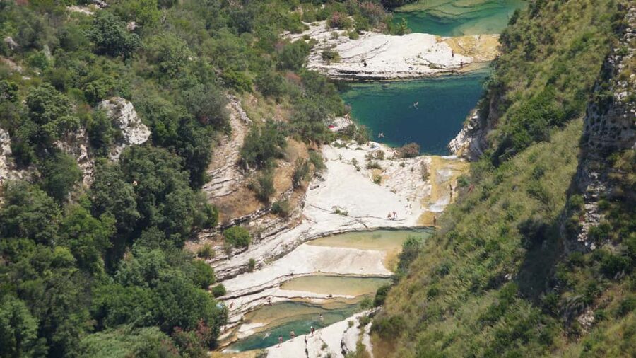 From Syracuse: Cavagrande Natural Reserve Guided Trek - The rock pools swim break: bring swimwear and towel
