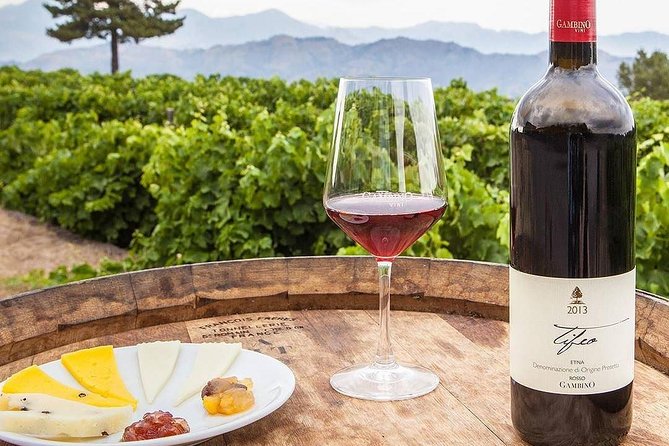 From Syracuse: Private Tour of Three Etna Wineries with food - Stop 3: red and white pours with a hearty local spread