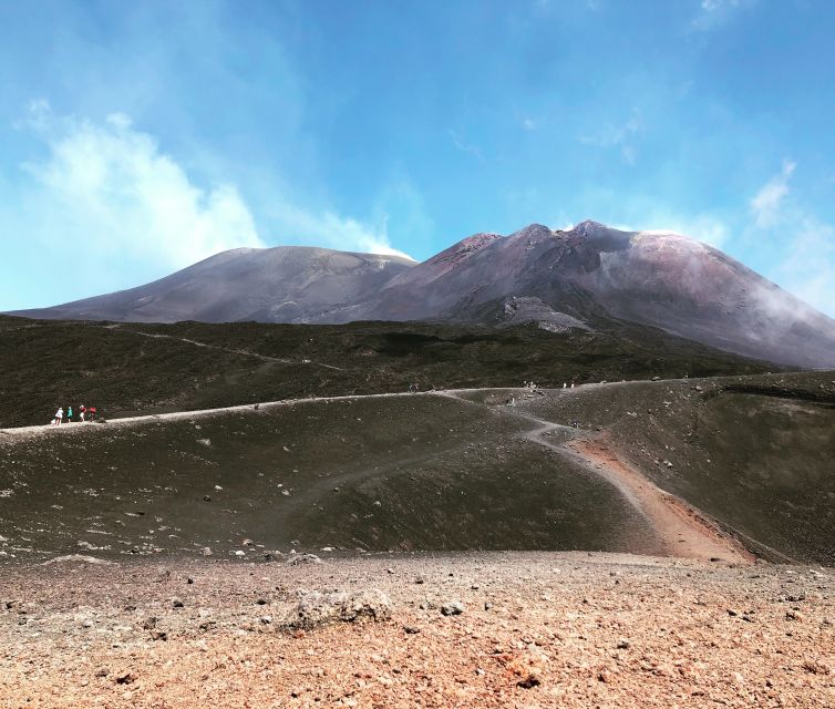 From Taormina: Etna Summit Area, Lunch & Alcantara Tour - The lava cave at about 2000 meters, with helmets and torches