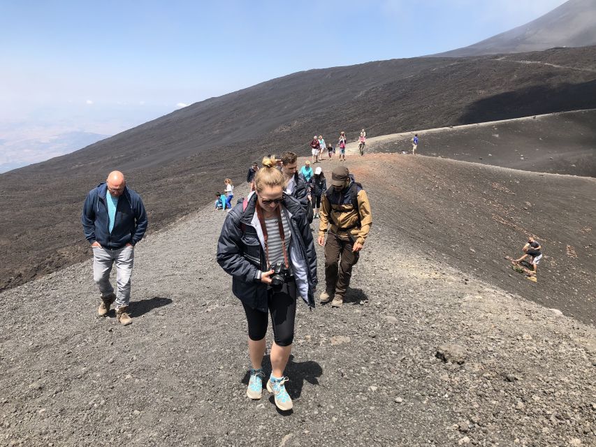 From Taormina: Etna Summit Area, Lunch & Alcantara Tour - The summit-area walk: black ash, extinct craters, and active views