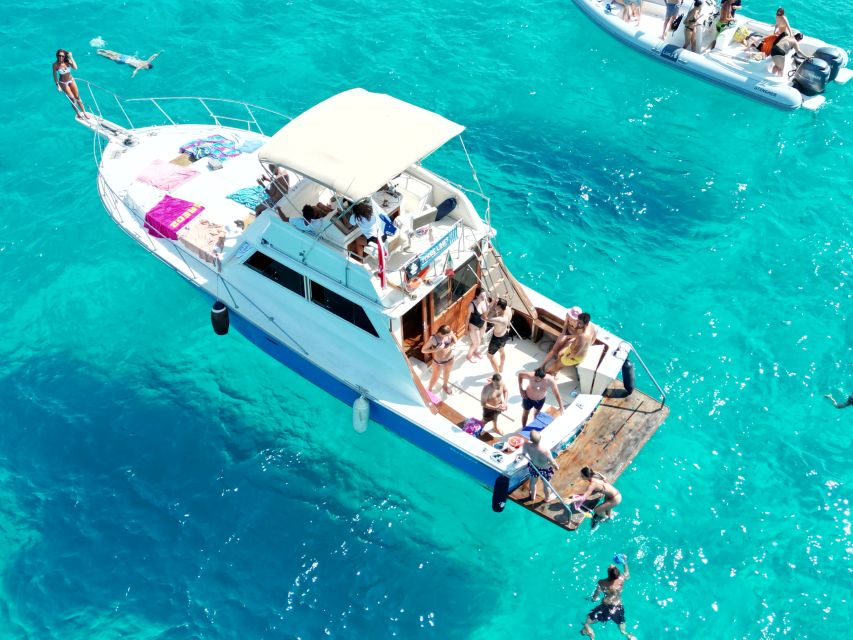 From Trapani: Favignana and Levanzo Boat Tour with Lunch - Favignana Photo Stops: Cala Azzurra, Bue Marino, and the Calcarenite Cave Area