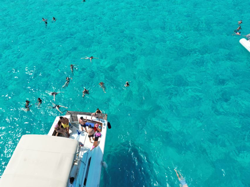 From Trapani: Favignana and Levanzo Yacht Tour with Stops - Favignana from the water, then a look at the town
