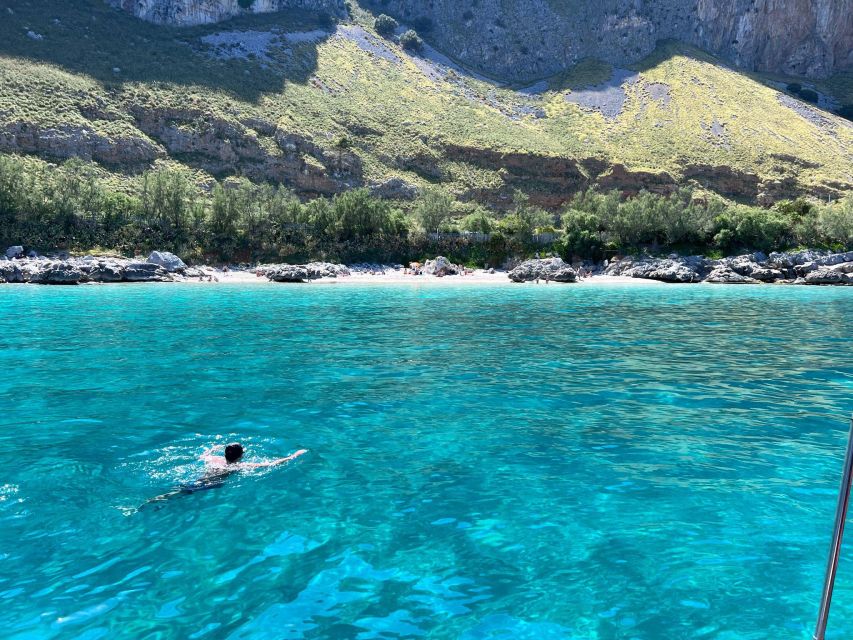 Full day boat tour in Palermo with Palermo in Boat - Stop 1 at Spiaggia Vergine Maria: photos first, then snorkeling time
