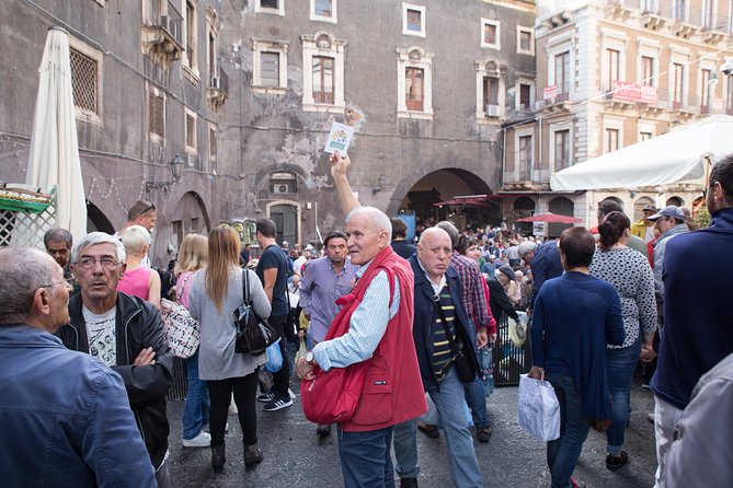 Gastronomic Street Food Tour of Catania - Via Etnea food break: Bar Savia arancini and Bakery Pacini cipollina
