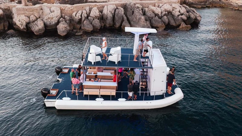Giardini Naxos: Dolphin Catamaran Sunset Tour with Aperetif - Cruising Giardini Naxos to Taormina at sunset