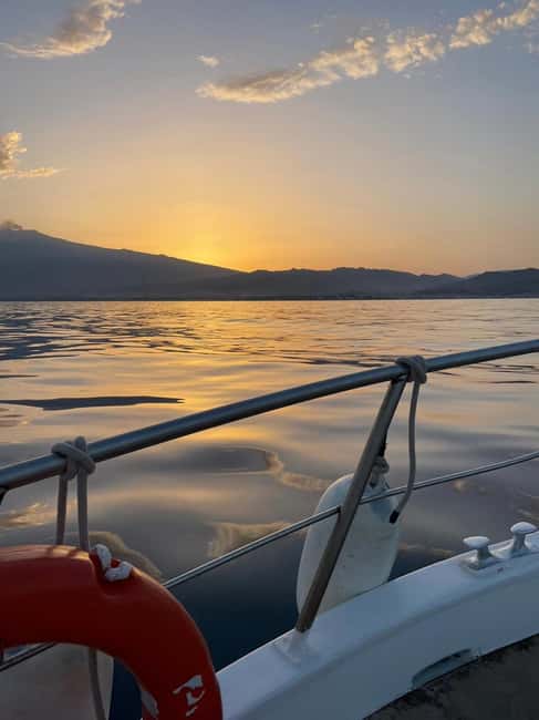 Giardini Naxos: Sunset Dolphin Watching Cruise with Aperitif - Snorkeling and swim time in clear water, plus the aperitif that keeps things fun