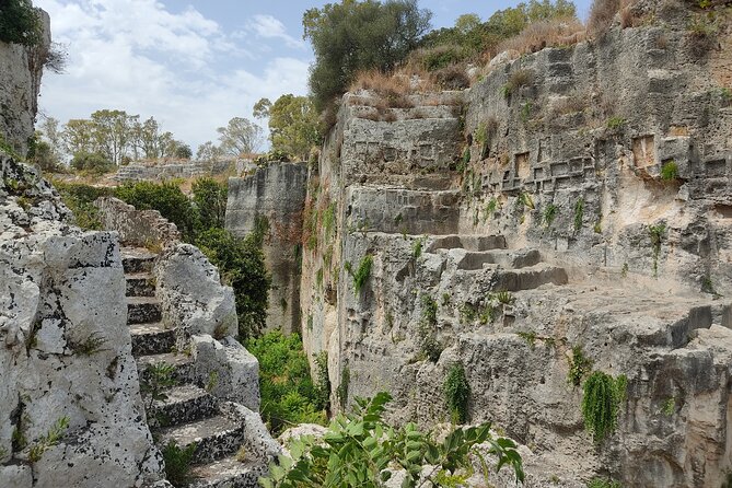 Group guided tour of the archaeological park of Neapolis - Ear of Dionysius: a cave visit that changes how you picture Syracuse