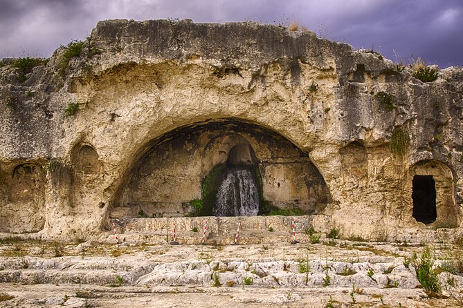 Group guided tour of the archaeological park of Neapolis - Teatro Greco: history, use, and why shows can affect your view