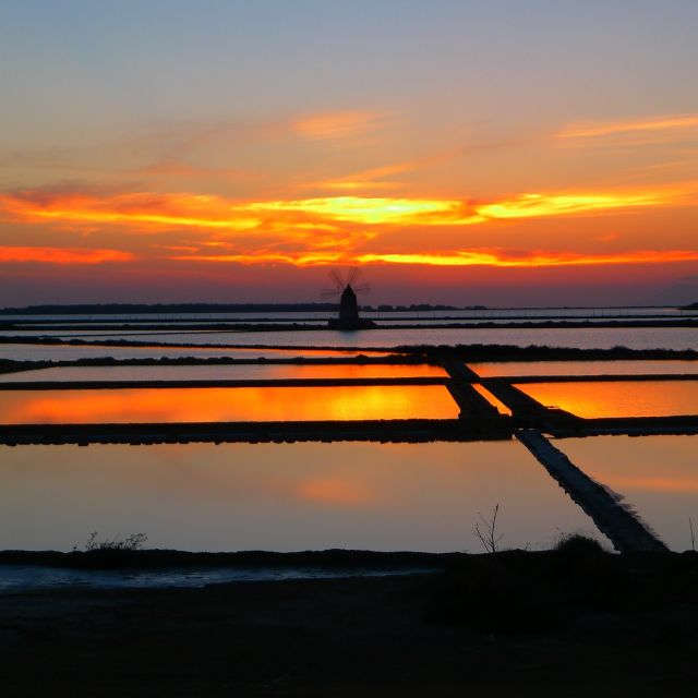 Guided tour of the Marsala Salt Pans and salt harvesting - Windmills, tanks, and canals: reading the Stagnone salt system