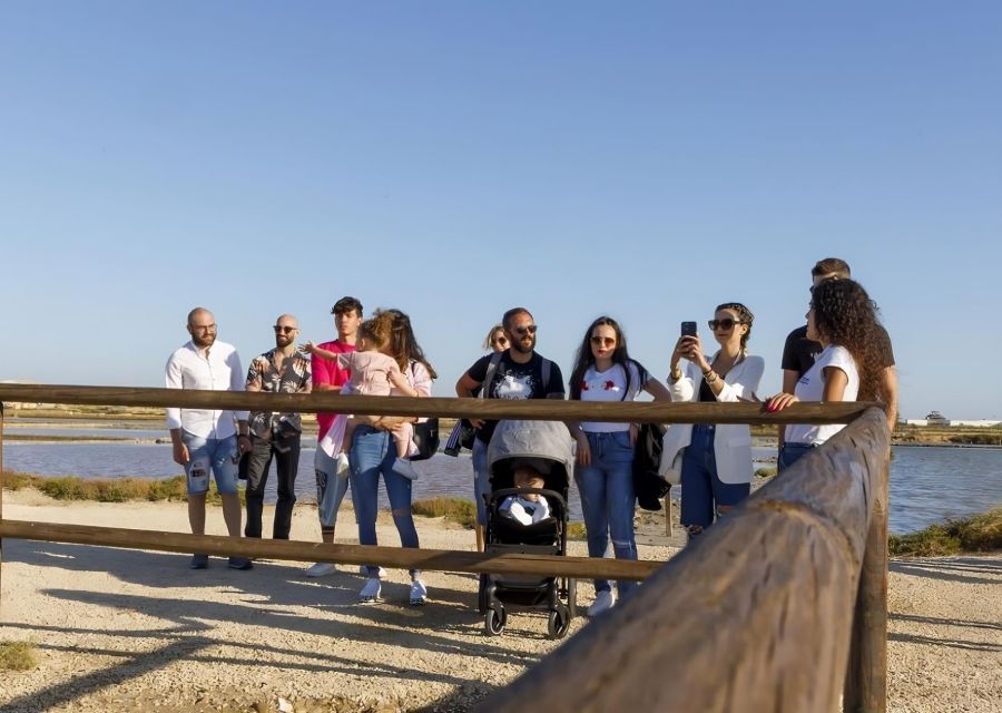 Guided tour of the Trapani Salt Pans and Salt Museum - Hands-on salt: collecting from the tanks and touching the real thing