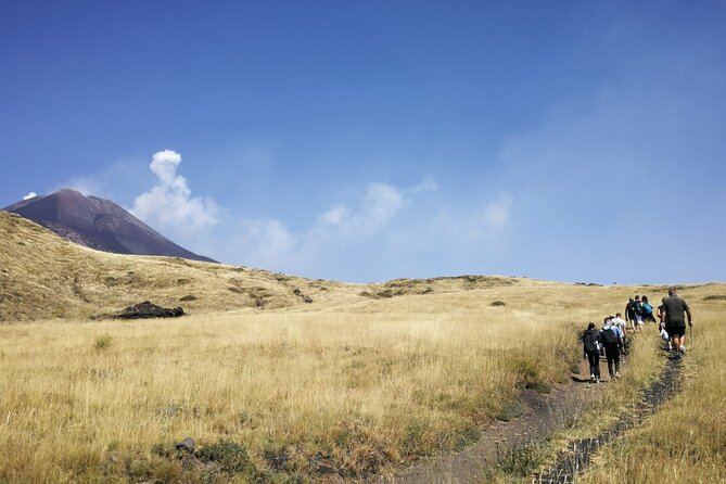 Guided Trekking on Etna and Visit of the Snow Cave - Lava flow cave tunnels: cool air and solid rock stories