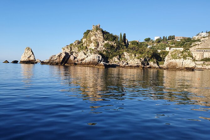 Half Day Private Guided Boat Tour in Taormina - Mazzarò Bay: turquoise water, classic Taormina elegance, and caves to spot