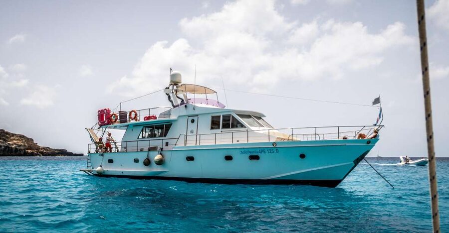 Lampedusa: Yacht excursion, swimming stops and typical lunch - Fish lunch on board: what you eat, and why it feels like a real meal