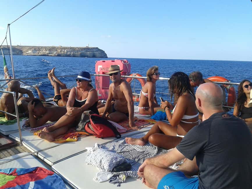 Lampedusa: Yacht excursion, swimming stops and typical lunch - Punta Muro Vecchio: the north coast stop for sapphire water