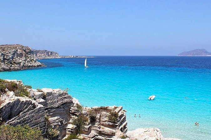 One Day Guided Boat Tour in Trapani with Snorkeling - Levanzo at 3:30pm: Faraglioni first, then more coves