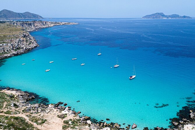 One Day Guided Boat Tour in Trapani with Snorkeling - First swim energy: the Favignana approach and Cala Azzurra